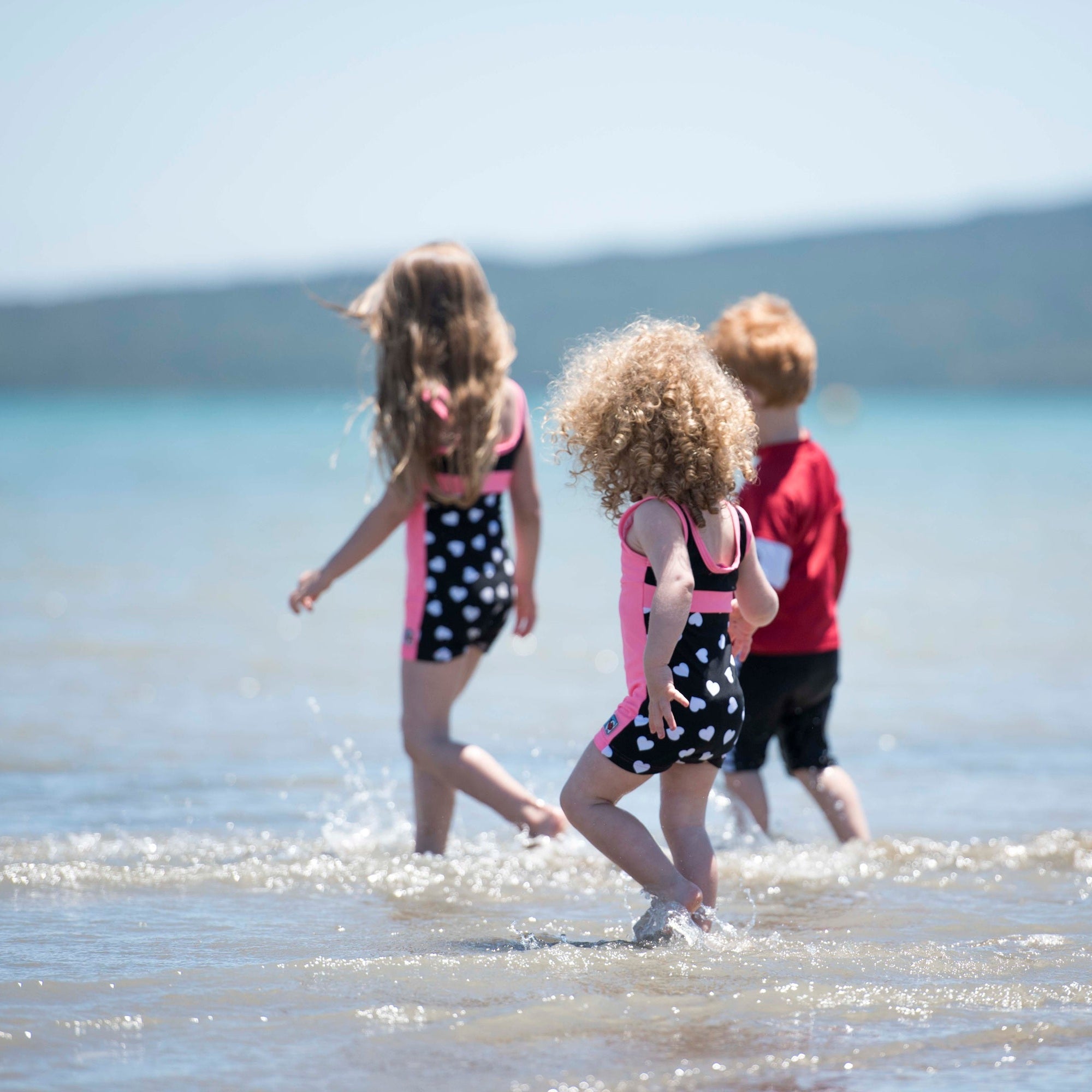 Girls One Piece Pink Hearts Racerback UPF 50+Swimsuit