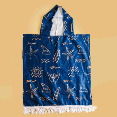 Blue hooded towel with white patterns on a beige background