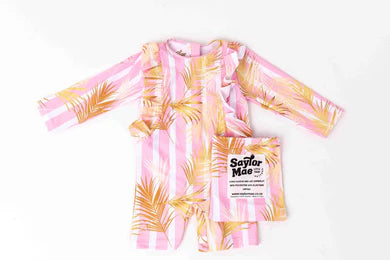 Pink and yellow striped dress with a matching pouch on a white background