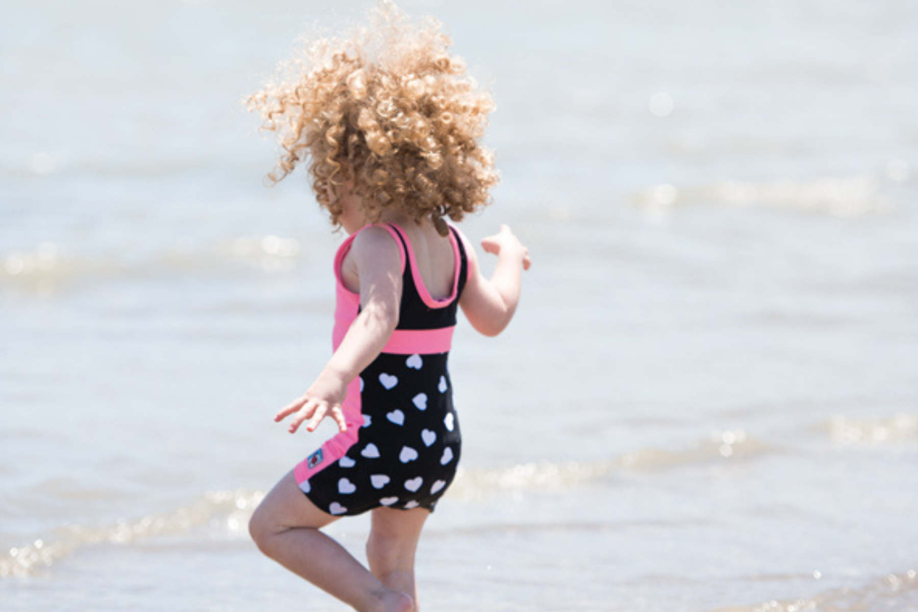 Girls One Piece Pink Hearts Racerback UPF 50+Swimsuit