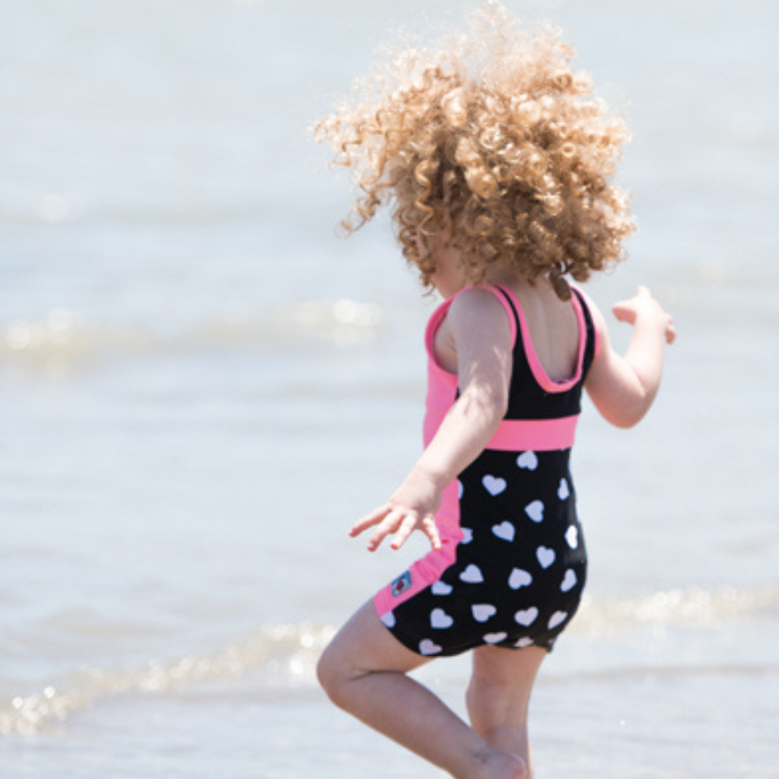 Girls One Piece Pink Hearts Racerback UPF 50+Swimsuit