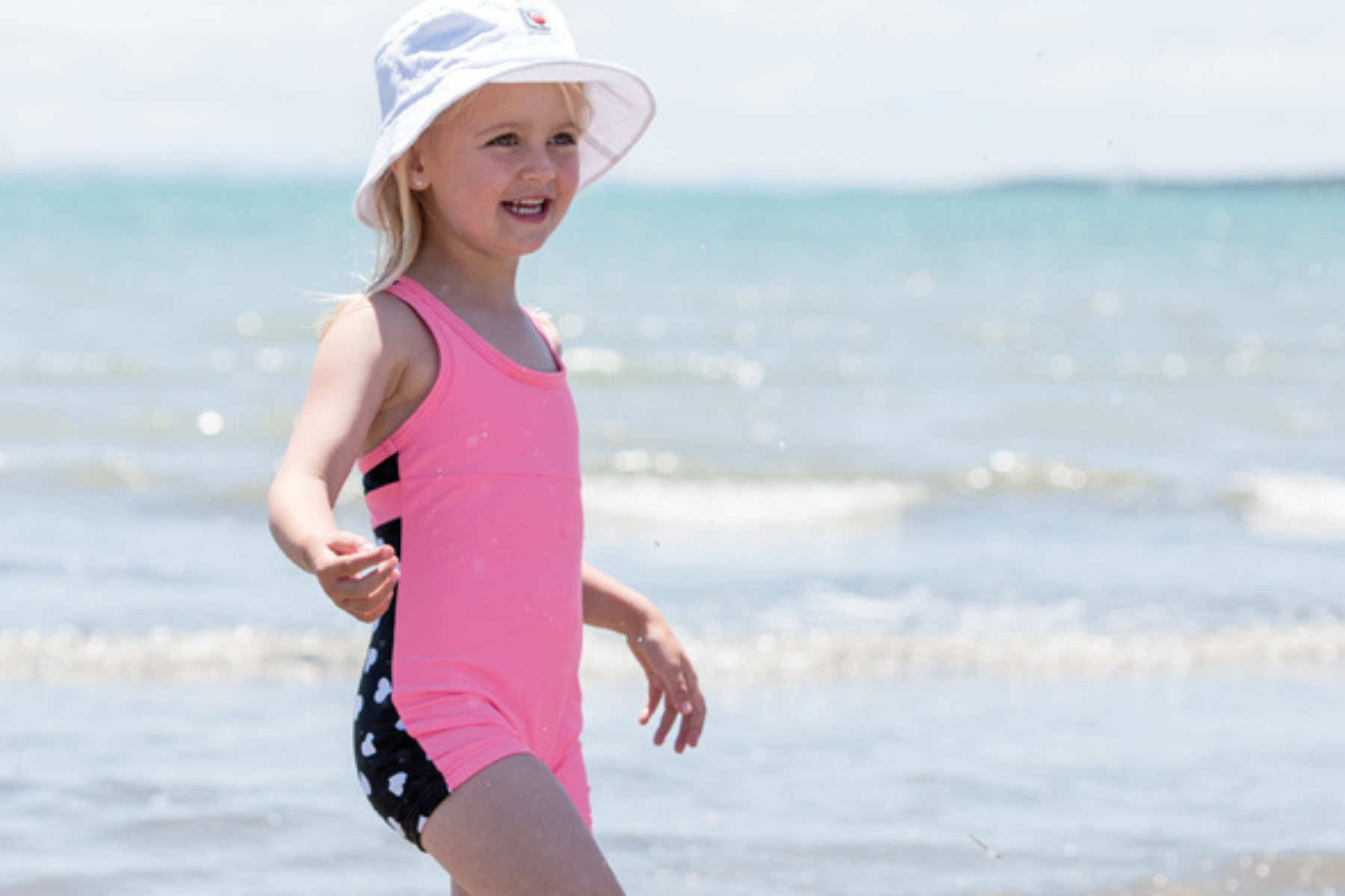 Girls One Piece Pink Hearts Racerback UPF 50+Swimsuit