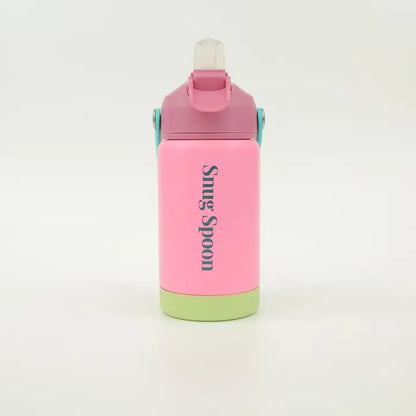 Pink water bottle with green base and white lid on a white background